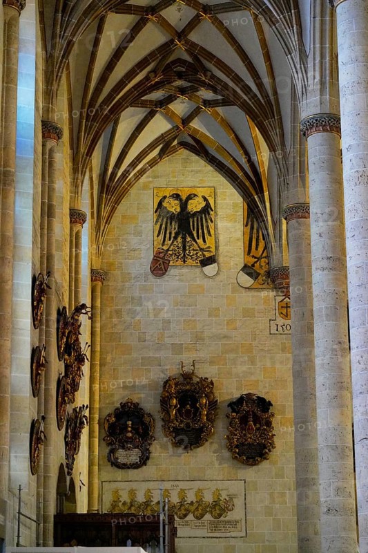 The interior of the largest Protestant church in Germany. It has the world's highest church tower, Ulm Minster, Germany, Europe, Interior view of a Gothic church with coats of arms on the walls, Ulm