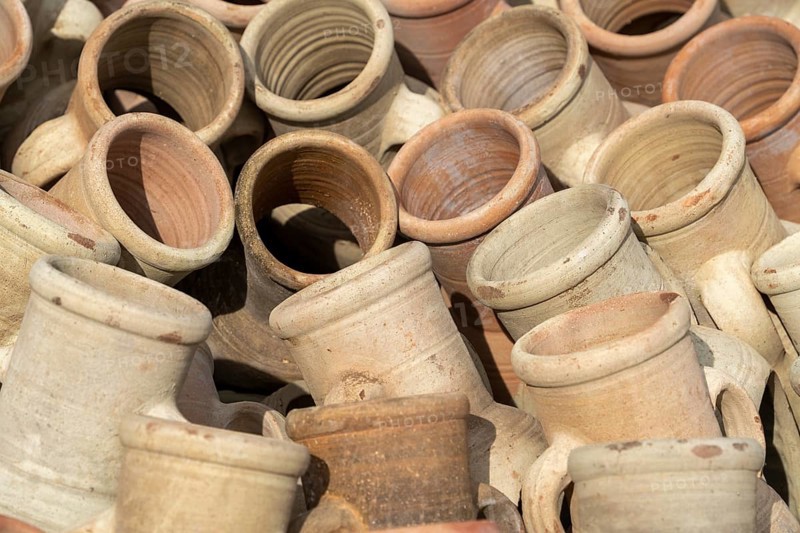 Full frame shot showing lots of sunny illuminated amphoras