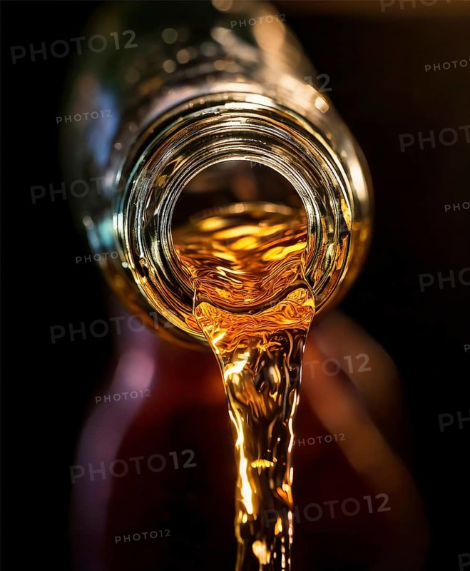 AI-generated close-up image showing a bottle as a clear drink is poured from it, AI generated