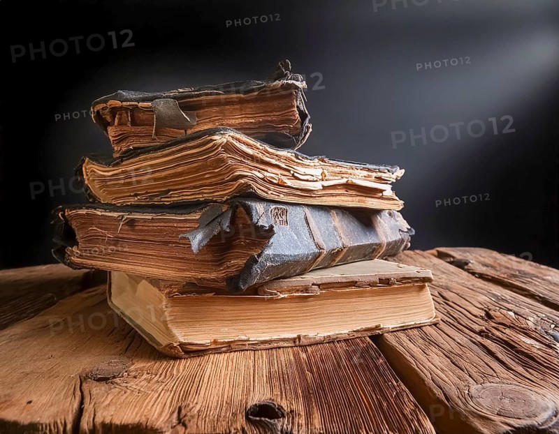 AI generated image showing stacked old rundown books on a wooden table