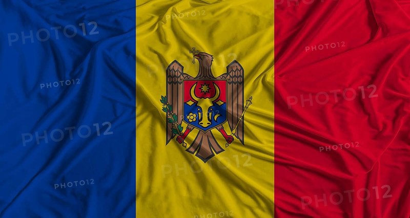 Moldovan flag with fabric texture background. National flag of Moldova