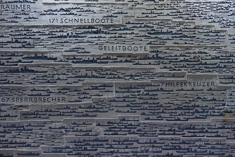 Graphic representation with silhouettes of ships and German texts on typology on a grey background, Naval Memorial, Laboe, Kiel Fjord, Schleswig-Holstein, Germany