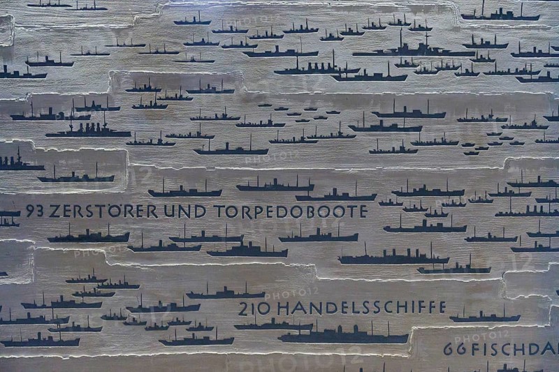 Dark silhouettes of ships on a plate, accompanied by German texts on the number and types of ships, Naval Memorial, Laboe, Kiel Fjord, Schleswig-Holstein, Germany