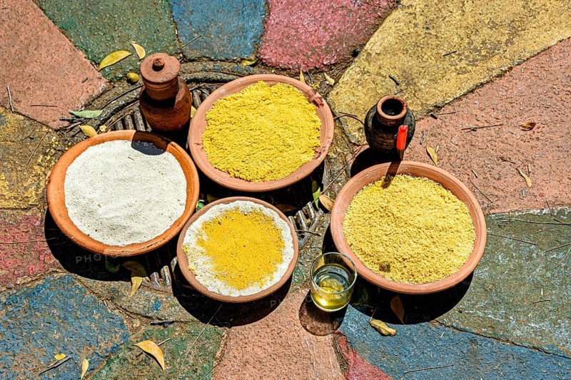 Food on a clay plate being offered to Exu in an Umbanda and Candomble ceremony