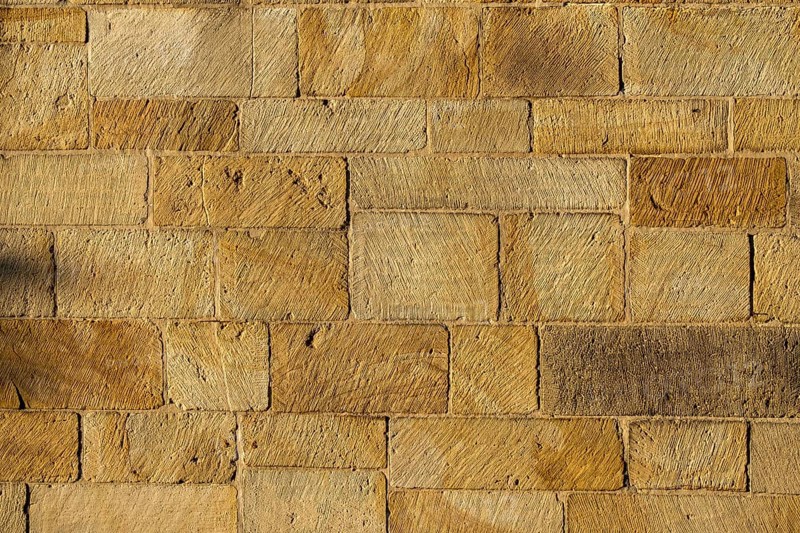 Yellow sandstone wall, sandstone wall, background, texture, Münsterland, North Rhine-Westphalia, Germany