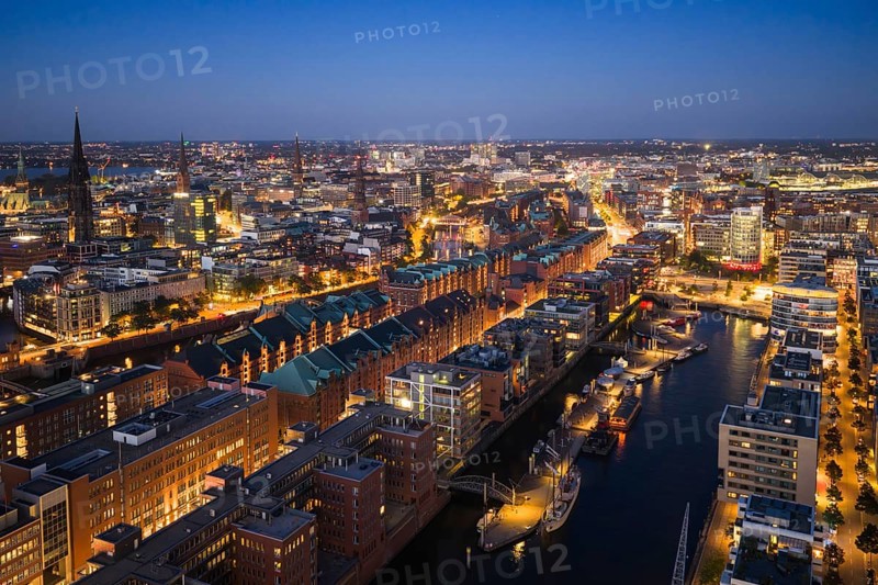 Aerial view of the historic warehouse district of Hamburg and Sandtor harbour at blue hour, Hamburg, Germany