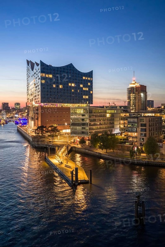Aerial view of the Elbphilharmonie with ferry pier during the blue hour, Hamburg, Germany