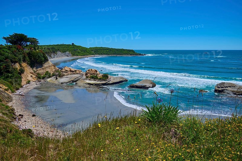 Beach and coastal landscape with blue sky, Cape Foulwind, West Coast, South Island, New Zealand