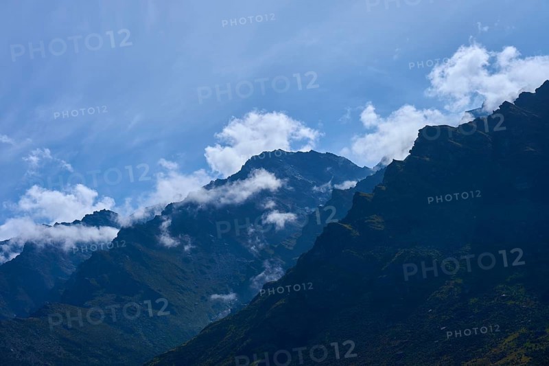 Landscape with dramatic mountain range under blue sky, Drift Bay, Lake Wakatipu, Queenstown-Lakes District, Otago, South Island, New Zealand