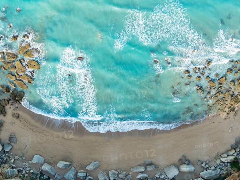 The Roche coves at he Mediterranean Sea. Aerial view. Drone shot. Cádiz province, Andalusia, Spain