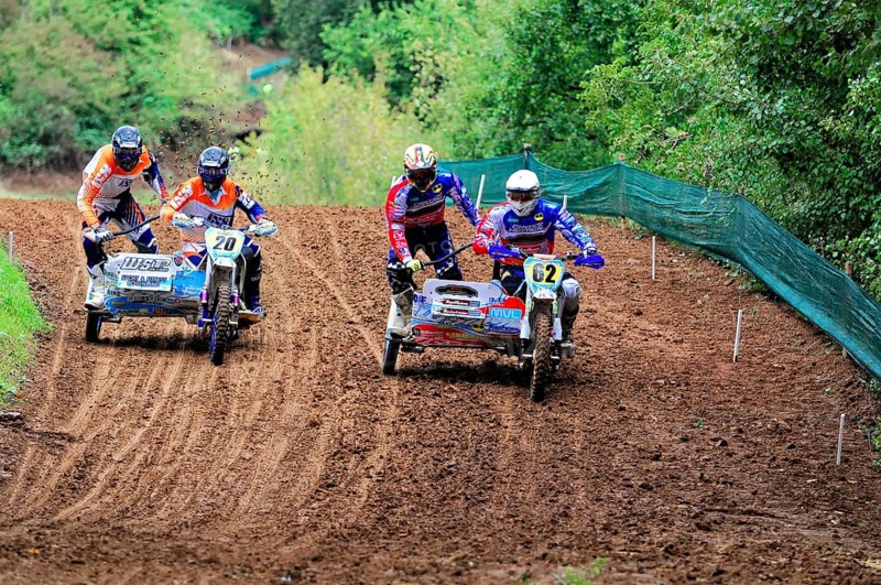 Motocross, Rudersberg, Baden-Württemberg, Germany, Europe, Two sidecar motorbikes in close competition on a winding race track in the forest, Rudersberg Motocross