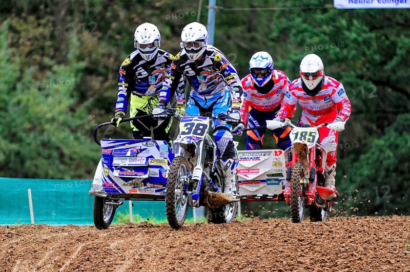 Motocross, Rudersberg, Baden-Württemberg, Germany, Europe, Two teams of motorcyclists riding over uneven ground during a race, Rudersberg motocross