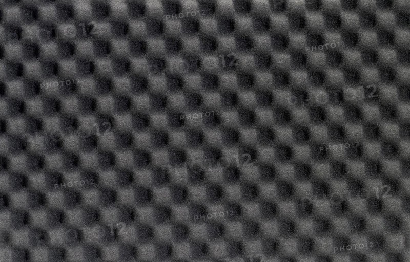 Full frame background of black foam plastics