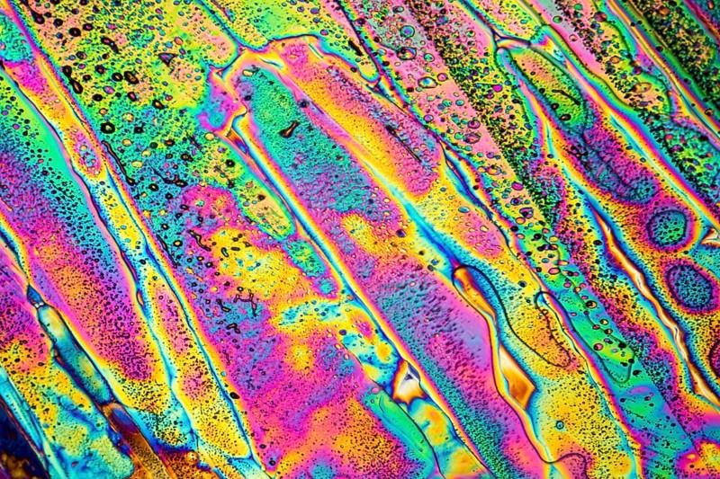 Colorful microscopic shot of Sodium acetate micro crystals in polarized light