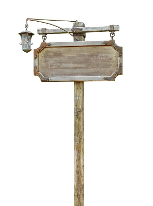 Wooden historic signpost isolated in white back