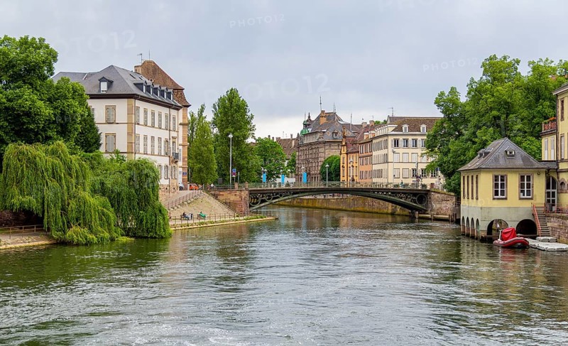 Idyllic waterside impression of Strasbourg, a city at the Alsace region in France