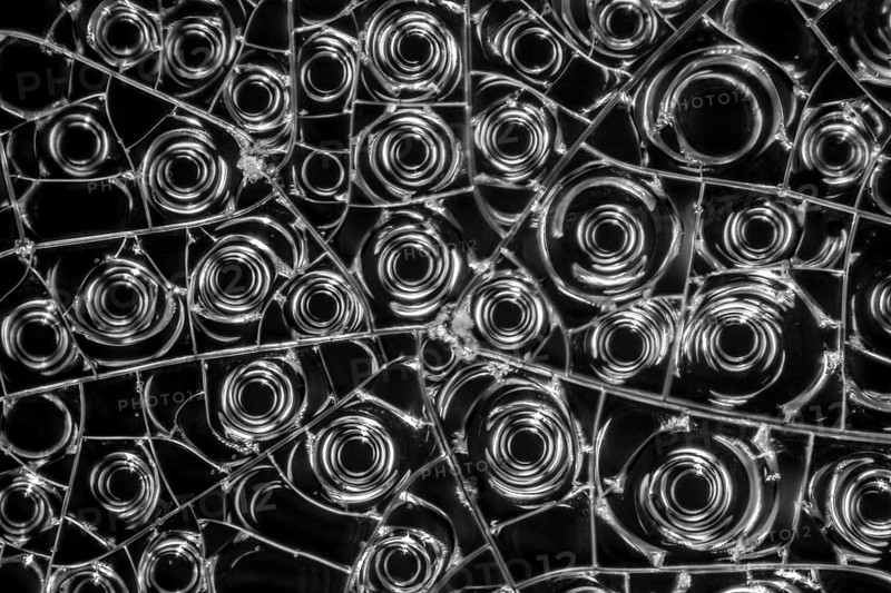 Microscopic detail of some dried egg white in dark back