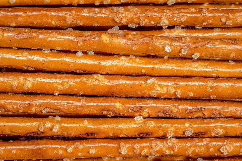 Closeup of some salt sticks in light back