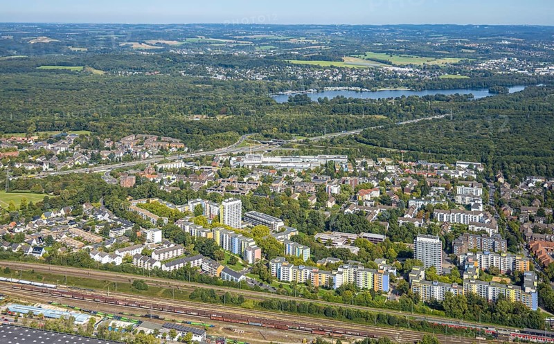 Aerial view, residential area district Hassels with high-rise buildings and view to Unterbacher See, Hasseler Forst and motorway A46 with triangle Düsseldorf-Süd, Hassels, Düsseldorf, Ruhr area, North Rhine-Westphalia, Germany, DE, Europe, aerial view, aerial photography, aerial photography, overview, bird's-eye view, overview