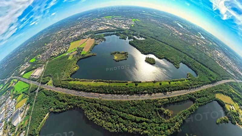 Aerial photo, Elbsee and Unterbacher See with forest area, motorway A46 at Hasseler Forst, earth globe, fisheye image, 360 degree image, tiny world, little planet, fisheye image, Hilden, Ruhr area, North Rhine-Westphalia, Germany, motorway, quarry pond, DE, Düsseldorf, Europe, fisheye lens, fisheye lens, little planet, aerial view, aerial photography, aerial photography, nature reserve, lake, road traffic, super wide angle lens, tiny world, overview, bird's eye view, globe, birds-eyes view, fisheye lens, green lung, insta360 camera, overview