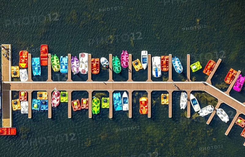 Aerial view, colourful pedal boats at a jetty on the Unterbacher See at the campsite north, Unterbach, Düsseldorf, Ruhr area, North Rhine-Westphalia, Germany, boats, DE, Europe, aerial view, aerial photography, aerial photography, overview, bird's-eye view, overview