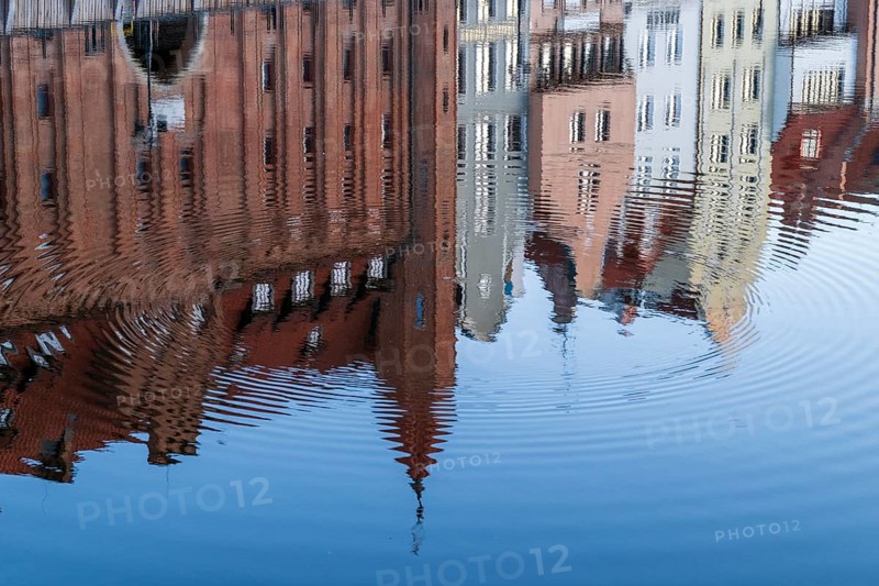 Waterfront promenade with reflection at sunrise in the Old Town, Motlawa River, Gdansk, Gdansk, Poland
