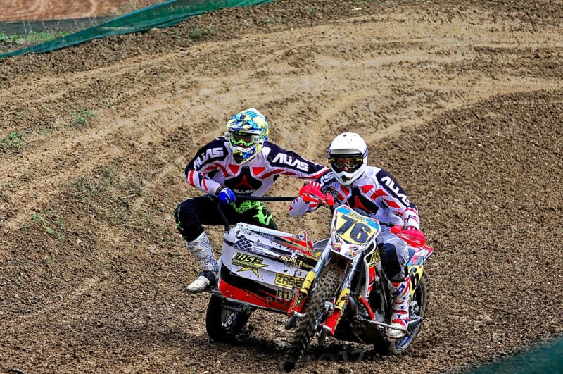 Motocross, Rudersberg, Baden-Württemberg, Germany, Europe, Rider with sidecar riding through an earthy bend, both in full gear, Rudersberg Motocross