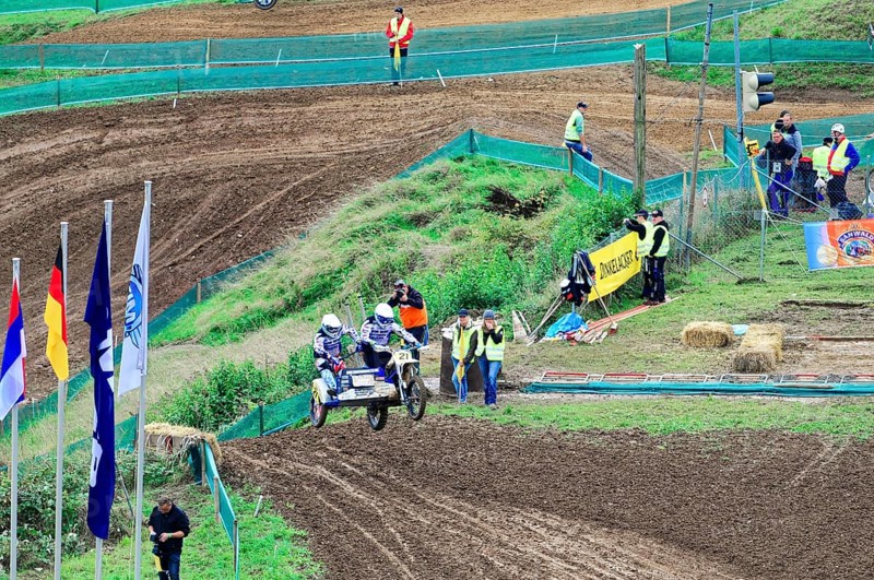 Motocross, Rudersberg, Baden-Württemberg, Germany, Europe, Motorcyclists with sidecars race on a muddy track surrounded by spectators, Rudersberg Motocross