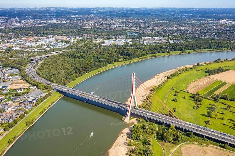 Aerial view, Fleher Bridge with bridge pylon over the river Rhine, inland navigation, motorway A46, Flehe, Düsseldorf, Ruhr area, North Rhine-Westphalia, Germany, motorway, bridge, DE, Europe, aerial view, aerial photography, aerial photography, ship, cable-stayed bridge, road traffic, overview, bird's-eye view, overview