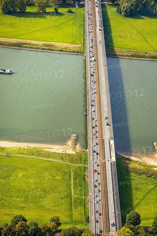 Aerial view, construction site and one-way trafficable Josef-Kardinal-Frings-Bridge over the river Rhine, federal road B1, Hammfeld, Neuss, Ruhr area, North Rhine-Westphalia, Germany, bridge, DE, Düsseldorf, Europe, river, aerial view, aerial photography, aerial photography, road traffic, overview, bird's-eye view, overview