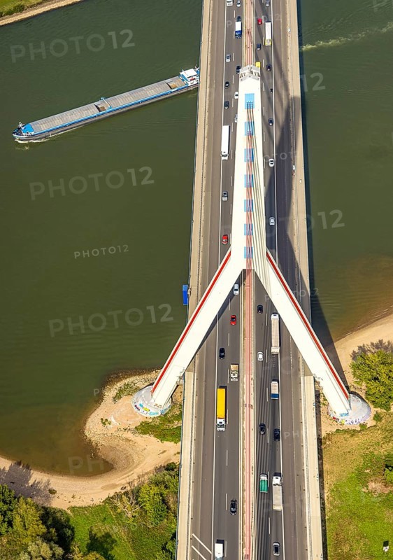 Aerial view, Fleher Bridge with bridge pylon over the river Rhine, inland navigation, motorway A46, Flehe, Düsseldorf, Ruhr area, North Rhine-Westphalia, Germany, motorway, bridge, DE, Europe, aerial view, aerial photography, aerial photography, ship, cable-stayed bridge, road traffic, overview, bird's-eye view, overview