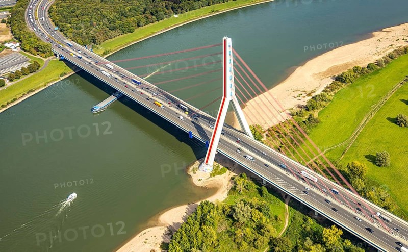 Aerial view, Fleher Bridge with bridge pylon over the river Rhine, inland navigation, motorway A46, Flehe, Düsseldorf, Ruhr area, North Rhine-Westphalia, Germany, motorway, bridge, DE, Europe, aerial view, aerial photography, aerial photography, ship, cable-stayed bridge, road traffic, overview, bird's-eye view, overview