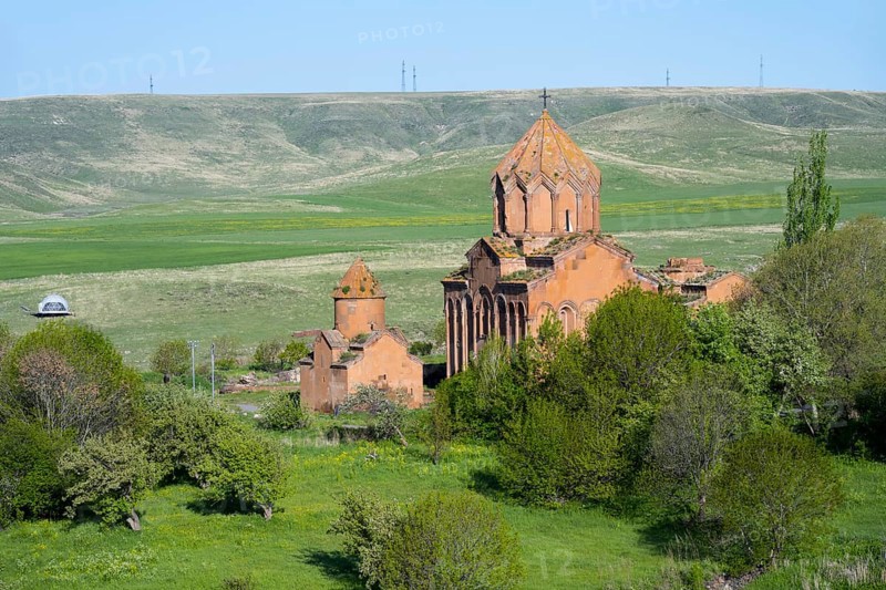 Historic church in the middle of a green landscape with hills and clear skies, Marmashen Monastery, Marmashen Vank, Shirak Province, Armenia