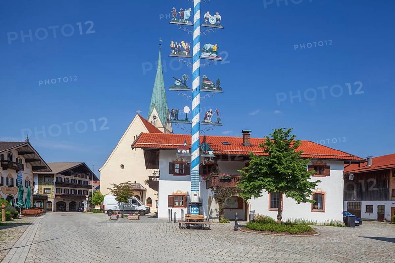 Parish Church of the Assumption of the Virgin Mary with maypole and town hall on the village square, Törwang, Samerberg, Chiemgau, Upper Bavaria, Bavaria, Germany