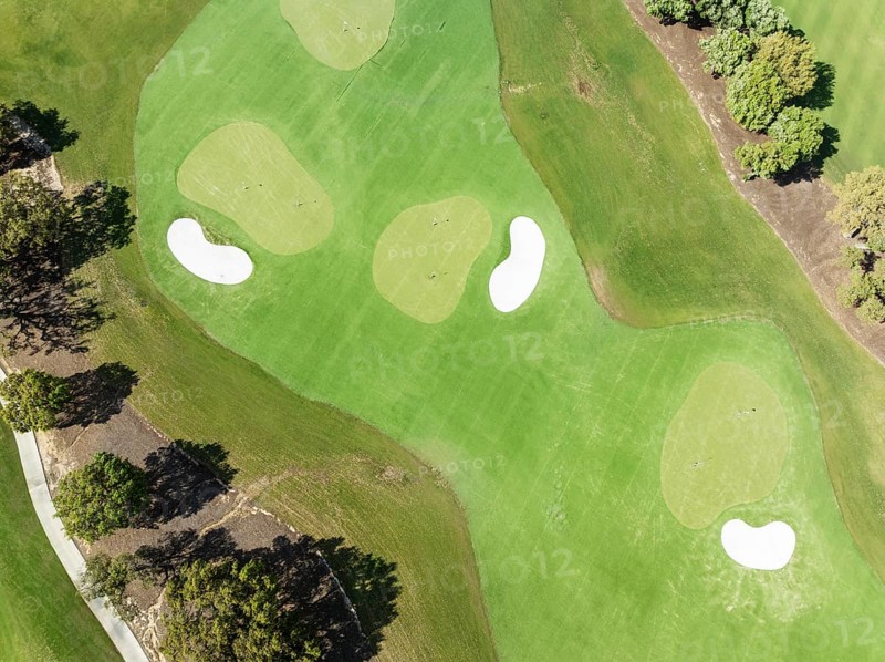 Driving range with greens and bunkers at the San Roque Club Golf Resort. Aerial view. Drone shot. Cádiz province, Andalusia, Spain