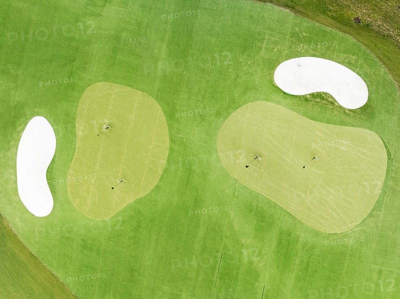 Driving range with greens and bunkers at the San Roque Club Golf Resort. Aerial view. Drone shot. Cádiz province, Andalusia, Spain