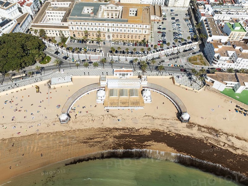 The old quarter of the town of Cádiz. Prominent the Caleta beach and the old Balneario de la Palma. Aerial view. Drone shot. Cádiz province, Andalusia, Spain