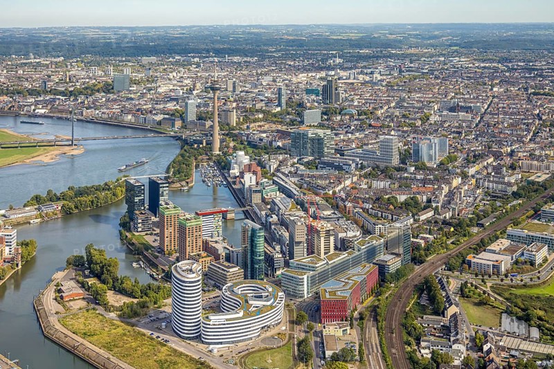 Aerial view, Media Harbour at the river Rhine, Rhine Tower and Rheinknie Bridge, in front construction site with construction crane and new Uniq Towers between Kaistraße and Zollhof, view over Düsseldorf City with Old Town, harbour, Düsseldorf, Ruhr area, North Rhine-Westphalia, Germany, Old Town, construction work, construction area, construction site, building plots, construction, construction project, construction site, bridge, DE, Europe, commercial enterprise, commercial space, commercial area, commercial property, commercial location, commercial use, industrial area, industrial location, aerial view, aerial photography, aerial photography, new building, tower, overview, bird's eye view, birds-eyes view, overview