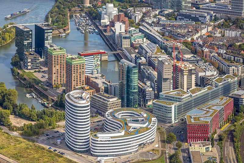 Aerial view, Media harbour on the river Rhine, construction site with construction crane and new Uniq Towers between Kaistraße and Zollhof, harbour, Düsseldorf, Ruhr area, North Rhine-Westphalia, Germany, construction work, construction area, construction site, building plots, construction project, construction site, DE, Europe, commercial enterprise, commercial area, commercial area, commercial property, commercial site, commercial use, industrial area, industrial site, aerial photograph, aerial photography, aerial photography, media centre, new building, overview, bird's-eye view, birds-eyes view, overview