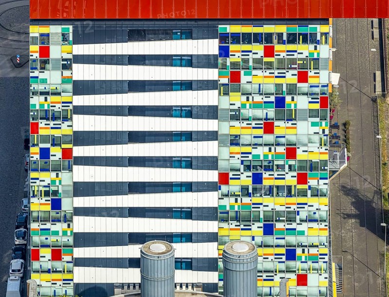 Aerial view, Colorium Hotel Innside Düsseldorf harbour and artistic coloured glass panel facade, shapes and colours, harbour, Düsseldorf, Ruhr area, North Rhine-Westphalia, Germany, DE, Europe, aerial view, aerial photography, aerial photography, overview, bird's-eye view, overview
