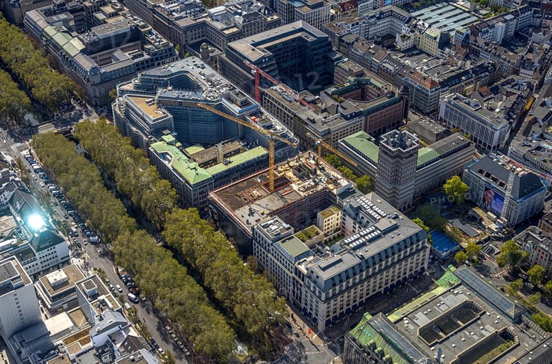 Aerial view, old town with office buildings and shopping mall, Baumallee and Königsallee, Breitenbacher Hof and construction site car park Königsallee corner Benrather Straße, office building Wilhelm-Marx-Haus with tower, city centre, Düsseldorf, Rhineland, North Rhine-Westphalia, Germany, construction work, construction area, construction site, building site, building project, construction project, construction site, DE, shopping mall, shopping mile, shopping street, shopping centre, Europe, pedestrian zone, aerial view, aerial photography, aerial photography, local supply centre, new building, shopping centre, tower, overview, bird's-eye view, overview