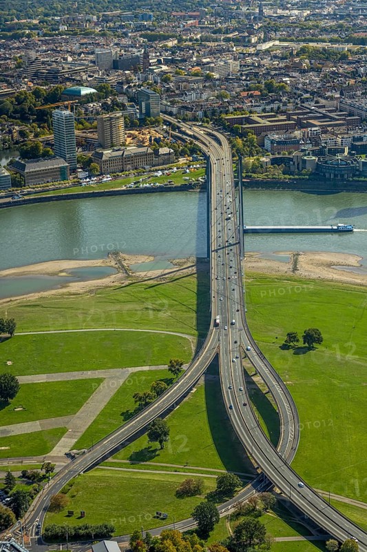 Aerial view, Rheinkniebrücke over the river Rhine, State Chancellery of North Rhine-Westphalia, event with pavilions, Rheinwiesen Oberkassel, Carlstadt, Düsseldorf, Ruhr area, North Rhine-Westphalia, Germany, Apollo-Platz, Bernhard Paul organiser, bridge, DE, Europe, events, river, culture, art, aerial view, aerial photography, aerial photography, road traffic, theatre, overview, events, event location, event centre, bird's-eye view, birds-eyes view, cultural use, overview