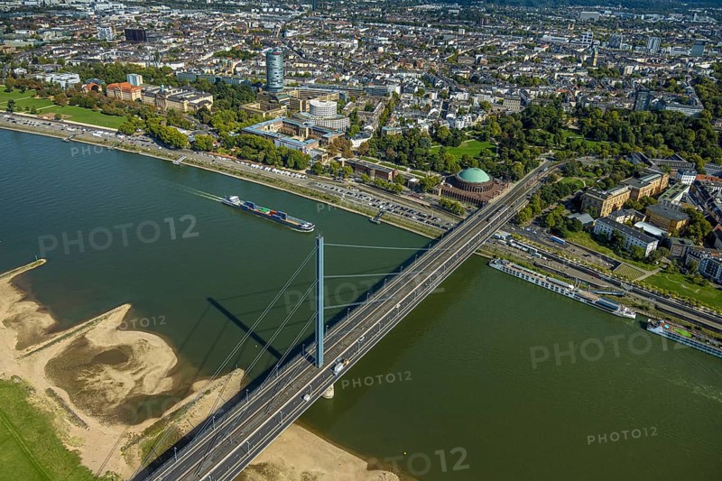Aerial view, Oberkasseler Brücke over the river Rhine and Tonhalle Düsseldorf, Rhine promenade, North Rhine-Westphalia-Forum Düsseldorf and Kunstpalast Düsseldorf in the Ehrenhof, district government and round high-rise building ERGO Group AG, Pempelfort, Düsseldorf, Ruhr area, North Rhine-Westphalia, Germany, bridge, DE, Europe, events, river, culture, art, aerial view, aerial photography, aerial photography, theatre, overview, event hall, event venue, event centre, bird's eye view, birds-eyes view, cultural use, overview