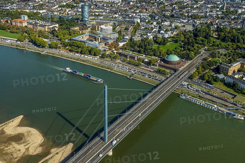 Aerial view, Oberkasseler Brücke over the river Rhine and Tonhalle Düsseldorf, Rhine promenade, North Rhine-Westphalia-Forum Düsseldorf and Kunstpalast Düsseldorf in the Ehrenhof, district government and round high-rise building ERGO Group AG, Pempelfort, Düsseldorf, Ruhr area, North Rhine-Westphalia, Germany, bridge, DE, Europe, events, river, culture, art, aerial view, aerial photography, aerial photography, theatre, overview, event hall, event venue, event centre, bird's eye view, birds-eyes view, cultural use, overview