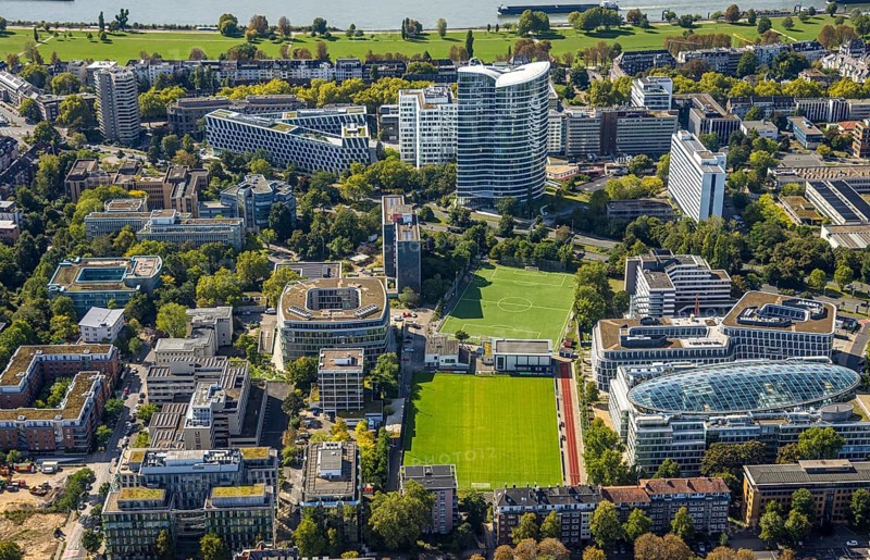Aerial view, Sky Office high-rise office building, sports centre north football stadium BV 04 Düsseldorf e.V., Spherion office building by architect Jürgen Koch, Golzheim, Düsseldorf, Ruhr area, North Rhine-Westphalia, Germany, DE, Europe, football, football field, football stadium, commercial enterprise, commercial area, commercial property, commercial site, commercial use, aerial photograph, aerial photography, aerial photography, sports, sports facility, sports field, overview, bird's eye view, birds-eyes view, overview