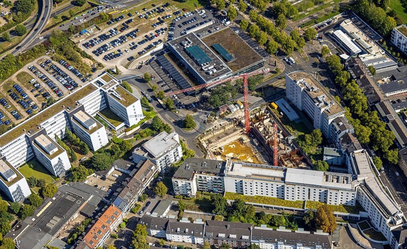 Aerial view, Hotel NH Düsseldorf City Nord, construction site and new Fishman Tower, Mercedes-Benz Rhein-Ruhr Mercedesstraße branch, Düsseltal, Düsseldorf, Ruhr area, North Rhine-Westphalia, Germany, construction work, construction area, construction site, building plots, construction project, construction site, DE, Europe, aerial view, aerial photography, aerial photography, new building, overview, bird's-eye view, overview