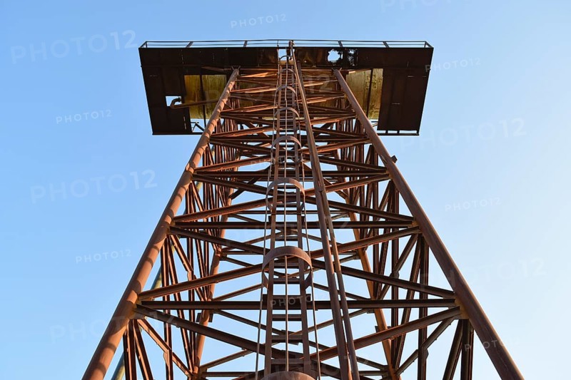 The old rusty water tower tilted. Atyrau, Kazakhstan