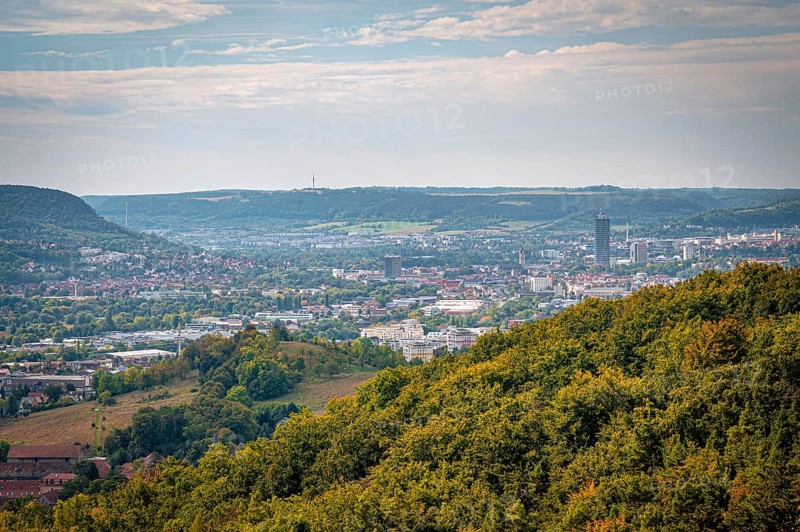 Urban landscape of Jena with forests, under an expansive sky, Jena, Thuringia, Germany