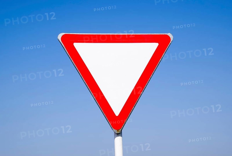 Road signs, give way. Sign on a blue background. Krasnodar, Russia