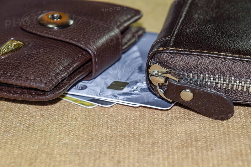 Brown leather wallet with credit and discount cards. Krasnodar, Russia